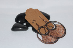 Dangle round earrings