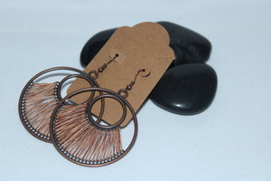 Dangle round earrings